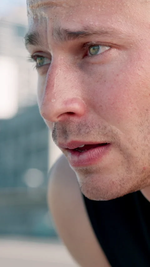 Runner, tired and face of man with sweat in city for exercise, cardio workout Stock Footage 331339069