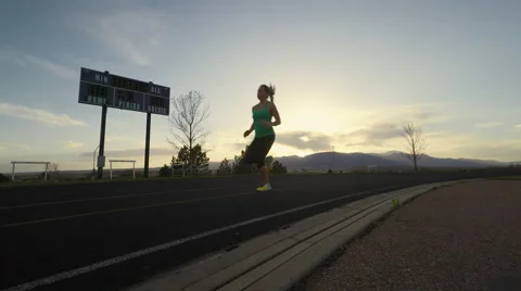 Runner On Track - Right to Left Stock Footage 49067022