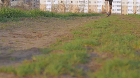 Runner training in fields Stock Footage 91177671