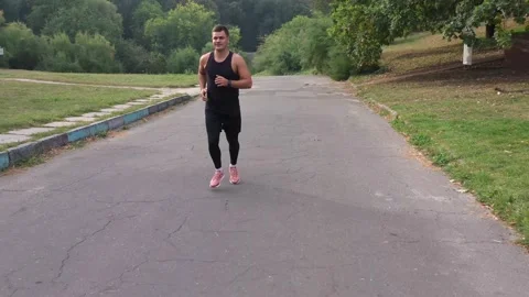 Runner training marathon. Energy jogger run.Fitness sportsman training cardio Stock Footage 141056730