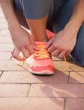 Runner trying running shoes getting ready for jogging Stock Photos
