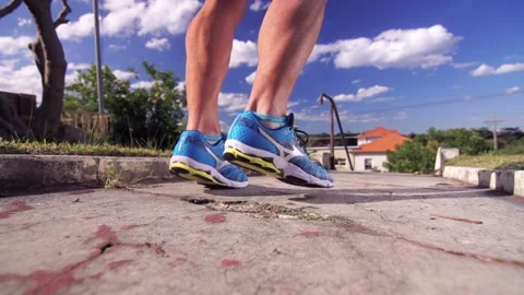 Runner warming up before going for a run / jog Stock Footage 132235477