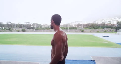 Runner, winner and athlete for training on stand, commitment and fitness for 動画素材 256966958