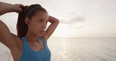 Runner woman getting ready to run and starts running Stock Footage 73435920