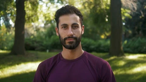 Runner young man in forest portrait, young sport handsome man in park, spanish Stock Footage 117994871