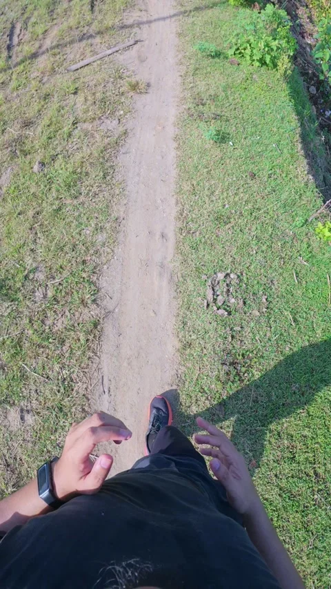 Runner&amp;#039;s Perspective on a Dirt Path. POV Stock Footage 309253908