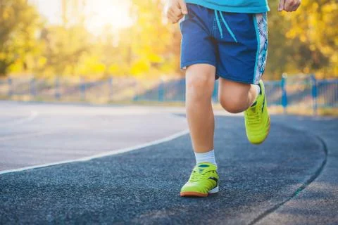 Runner&amp;#39;s Feet Running on Stadium Stock Photos