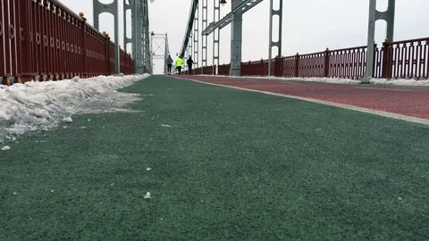 Runners at bridge 스톡 동영상 98800605