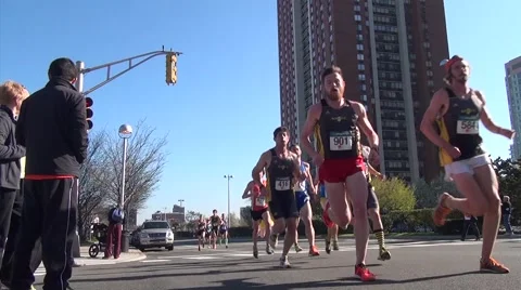 Runners by Camera Low Angle Video stock 50940928