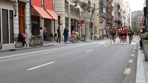 Runners compete in the 2017 Valencia Half Marathon in Valencia, Spain. Stock Footage 81372582