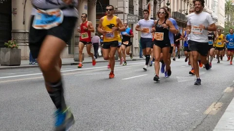 Runners compete in the 2017 Valencia Half Marathon in Valencia, Spain Stock Footage 81563418
