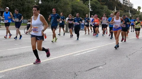 Runners compete in the 2017 Valencia Half Marathon in Valencia, Spain Stock Footage 81564971