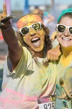 Runners Covered In Colored Corn Starch Celebrate Finishing Color Run Stock Photos