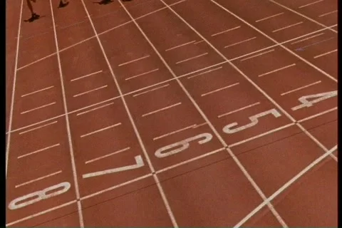 Runners crossing the finish line Stock Footage 2333982