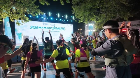 Runners Doing Warm Up Exercises on Stage Square before Dawn, Lushan Video stock 346715867