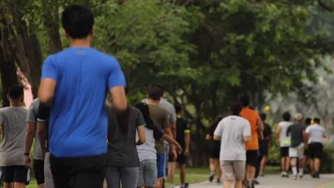 Runners Exercising in a Park Stock Footage 91215869