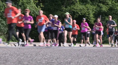 Runners in a marathon race pounding the pavement Stock Footage 39533523