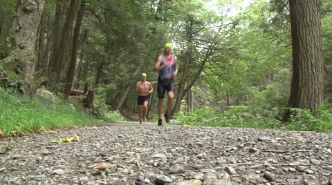RUNNERS ON MOUNTAIN TRAIL - 220 Video stock 51475762
