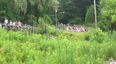 Runners in race on hill Video stock 52349214