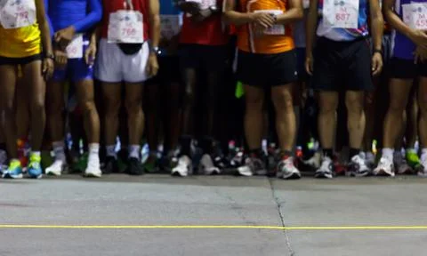Runners ready to run at starting point Stock Photos