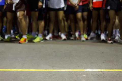 Runners ready to run at starting point Stock Photos