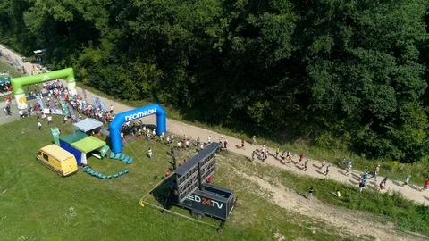 Runners run through the forest, aerial view Stock Footage 120409470