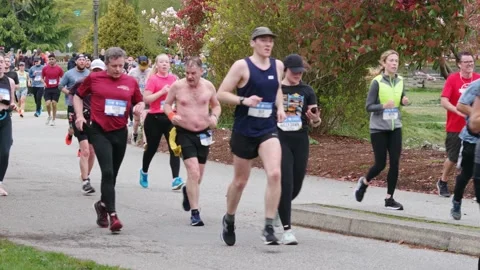 Runners Running During a Marathon - 4K Stock Footage 188869342