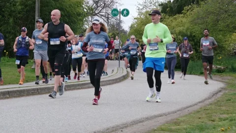 Runners Running During a Marathon - 4K Stock Footage 188871864