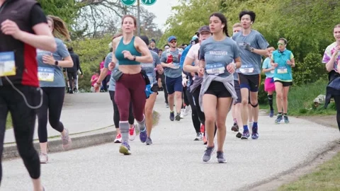 Runners Running During a Marathon - 4K Stock Footage 188875474