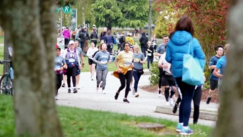 Runners Running During a Marathon - 4K Stock Footage 188877286