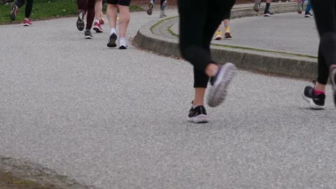Runners Running During a Marathon - 4K Stock Footage 188879614