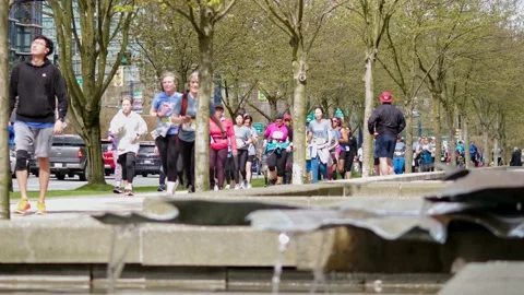 Runners Running During a Marathon - 4K Stock Footage 188879641