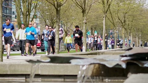 Runners Running During a Marathon - 4K Stock Footage 188879933