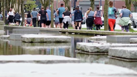 Runners Running During a Marathon - 4K Stock Footage 188890365