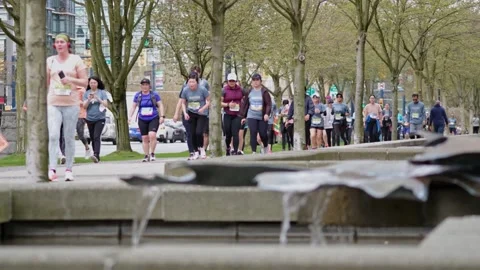 Runners Running During a Marathon Stock Footage 188876362