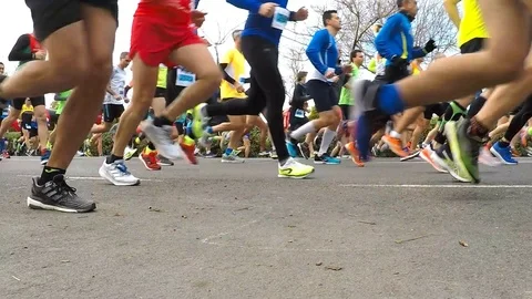 Runners at the Start of a Road Race Stock-Footage 103802947