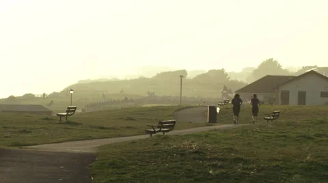 Runners on sunset Stock Footage 28282249