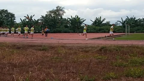 Running ability test for 2024 Indonesian Police Academy cadet admissions Stock Footage 276395442