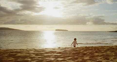 Running along the shore Stock Footage 105152744
