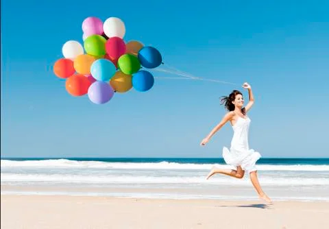 Running and jumping with ballons Stock Photos