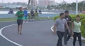 Running and riding bike in the park in Panama 4k or 4k+ Resolution