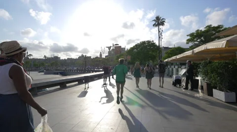 Running and walking on the seafront in Barcelona Stock Footage 52056581