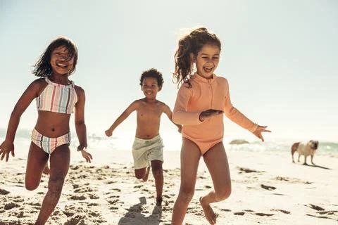 Running around at the beach Stock Photos