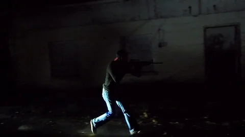 Running with assault rifle Stock Footage 69832940