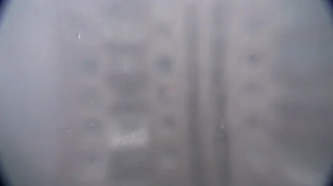 Running back drops of rain on glass Video stock 35608317