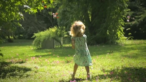 Running on the Backyard Stock Footage 74196808