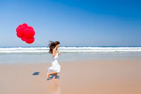 Running with ballons Stock Photos