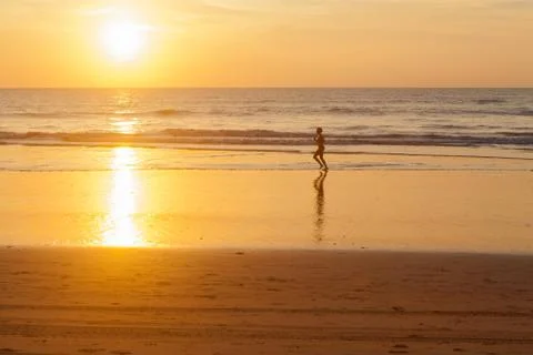 Running on the beach Stock Photos