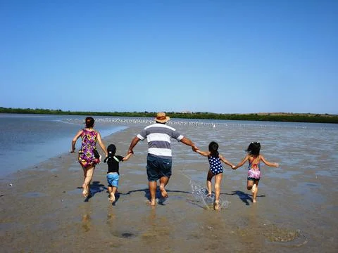 Running on the beach Stock Photos