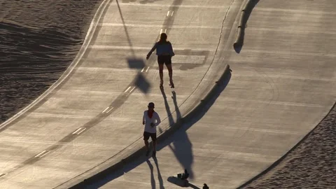 Running boardwalk venice Stock Footage 166692473
